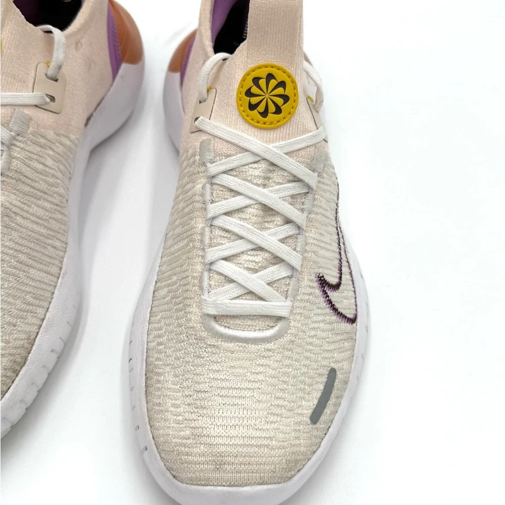 Nike Nike‎ Run Flyknit Next Nature Women's Sneakers in Cream, Purple, and Orange
